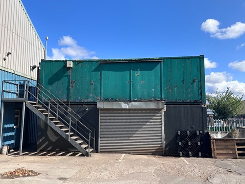 Green shipping container